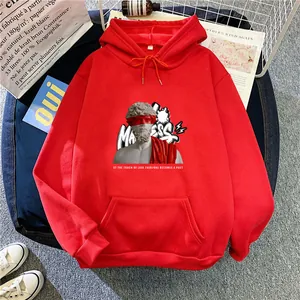 Close-up of red hoodie featuring artistic marble statue print and graffiti text detail