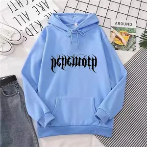 Close-up of light blue hoodie featuring gothic print and functional kangaroo pocket detail