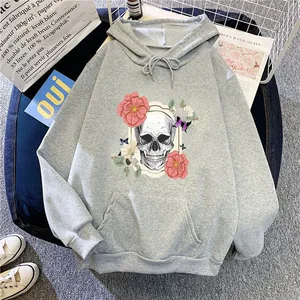 Detail of drawstring hood and artistic skull floral print on a grey casual hoodie