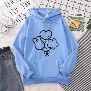 Flat lay of light blue hoodie featuring minimalist black heart and rabbit line art prints