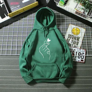 Close-up of dark green hoodie featuring white finger heart print and ribbed cuffs