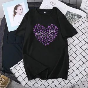 T-shirt noir oversize avec motif cœur trèfle violet et texte Falling in love again
