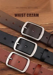 Close-up of three vintage genuine leather belts in black and brown with alloy buckles