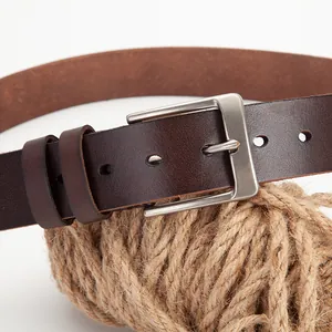 Classic dark brown leather belt for men with brushed metal buckle on natural rope