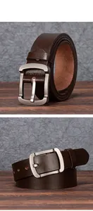 Detailed view of dark brown leather belt with silver matte buckle and textured edge finish