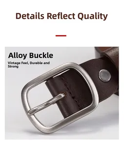 Détail d'une ceinture en cuir marron vintage avec boucle ardillon en alliage argent mat