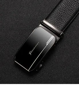 Close-up of black lychee grain leather belt with a sleek metal automatic buckle