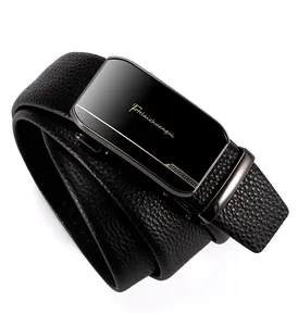 Detail of black lychee grain leather belt with a sleek black mirror-finish automatic buckle