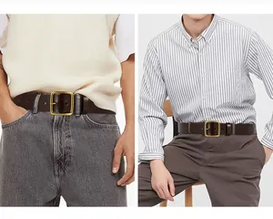 Detailed close-up of dark brown leather belt with vintage brass buckle on striped shirt