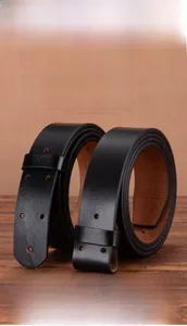 Detailed close-up of premium black full-grain leather belts with natural texture