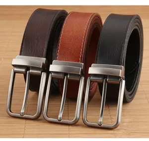 Three leather belts in black, brown, and tan colors with vintage brushed metal buckles