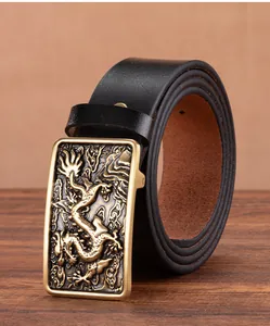 Detail of vintage black leather belt featuring a golden dragon relief buckle craftsmanship