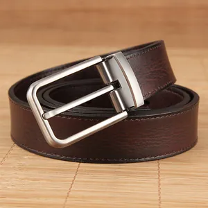 Business casual dark brown genuine leather belt with brushed silver needle buckle on bamboo mat