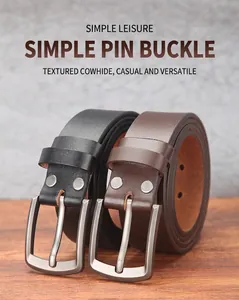 Close-up of premium brown and black leather belts with matte silver pin buckles