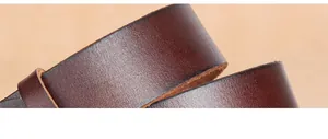 Close-up of premium full-grain cowhide leather texture on a vintage brown men's belt