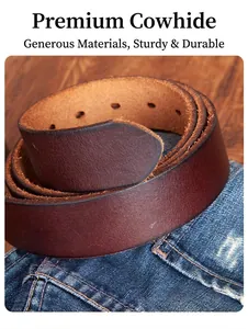 Close-up of premium brown cowhide leather belt showing thick texture on denim jeans