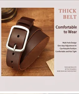 Detail of genuine brown leather belt with silver square buckle on wood surface