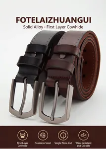 Close-up of genuine leather belts in black and brown with brushed metal pin buckles