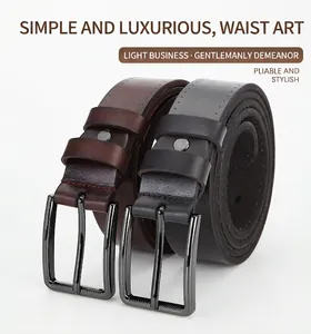 Detail of genuine leather belts with alloy pin buckles in black and dark brown