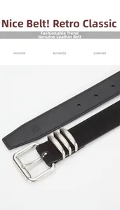 Détail d'une ceinture en cuir noir véritable avec boucle argentée et taille gravée