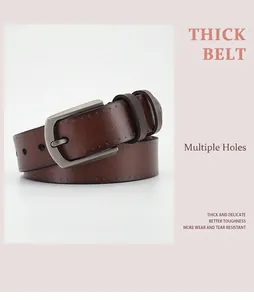 Detailed close-up of thick brown leather belt showing sturdy silver-gray metal buckle