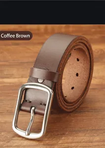 Close-up of coffee brown genuine leather belt with matte silver pin buckle and texture