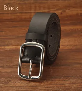 Close-up of black cowhide leather belt with matte texture and silver metal pin buckle