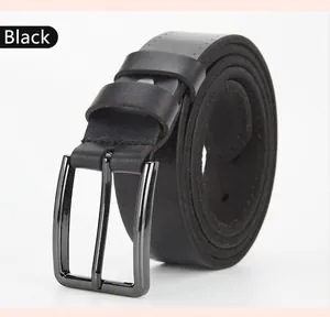 Detail view of black genuine leather men's belt with a gunmetal alloy pin buckle