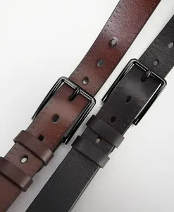 Detail of genuine cowhide leather belts with premium alloy pin buckle in black and brown
