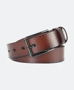 Detailed close-up of brown cowhide leather belt with gunmetal alloy pin buckle