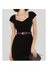 Brown frosted leather belt with silver oval buckle shown on a black dress waist
