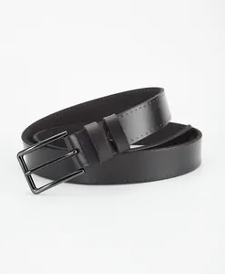 Detail of black leather belt with double prong alloy buckle and decorative embossing