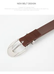 Detail of a brown frosted leather belt for women with a vintage oval silver metal buckle