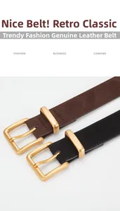 Detail of vintage genuine cowhide leather belts in brown and black with gold buckles