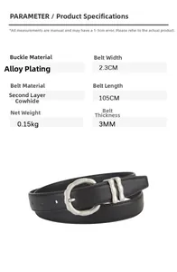 Détail d'une ceinture fine en cuir noir avec boucle argentée mate et largeur de 2,3 cm