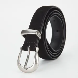 Minimalist black matte suede leather belt with polished silver horseshoe buckle for women