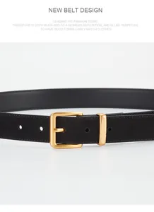Detail of a minimalist women's leather belt featuring a matte black finish and gold buckle