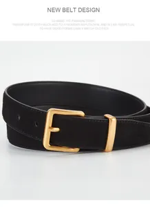 Detail of black suede leather belt with matte gold square buckle and textured finish