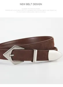 Detailed close-up of brown suede leather belt with vintage silver geometric buckle