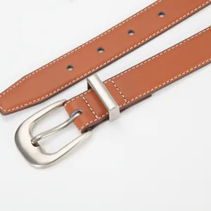 Brown leather belt with silver square buckle and white stitching for women’s pants