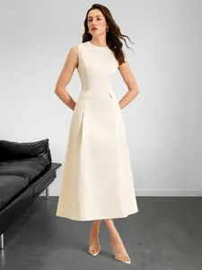 Detail of elegant sleeveless A-line summer dress in off-white with side pocket flaps
