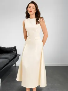 Detail of cream sleeveless midi dress featuring elegant waist flap pockets and slim fit