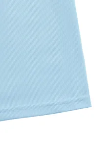 Detail of light blue ribbed knit dress showing high-quality double-needle hem stitching