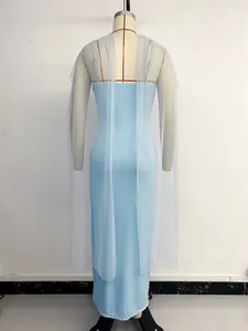 Detail of light blue bodycon maxi dress with ribbed texture and sheer mesh shawl wrap