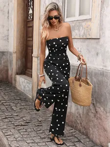 Vintage polka dot strapless jumpsuit with high waist wide leg design in black and white