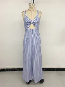 Detail of blue striped jumpsuit with V-neck cutout and stylish front twist knot design