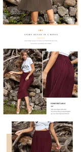 Detail of high waisted pleated maxi skirt with fine texture and solid wine red color