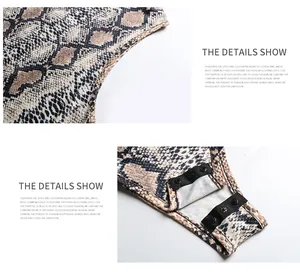 Detailed view of snake print bodysuit showing fabric texture and bottom snap button closure