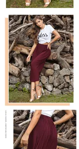 Detailed view of the burgundy pleated skirt fabric with elastic high waist design