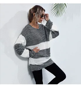 Dettaglio maglione a righe in maglia spessa con scollo rotondo e vestibilità ampia
